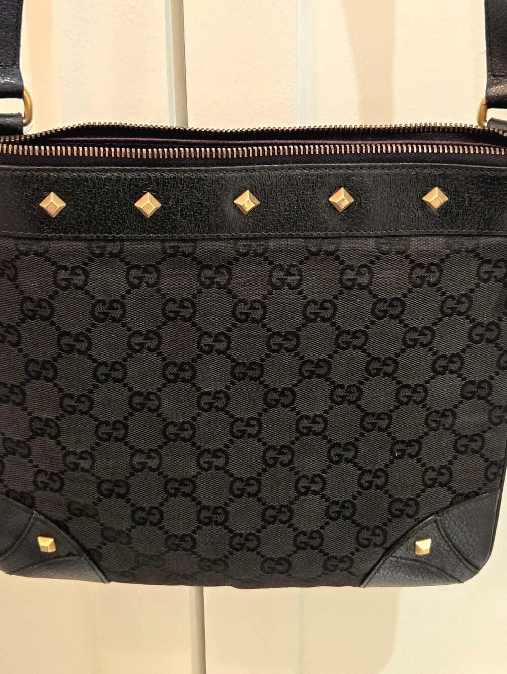 Black GG Monogram Shoulder Bag with Gold Stud Accents